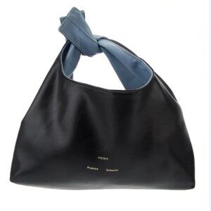 Exclusive Merit/Proenza Schouler collab makeup bag